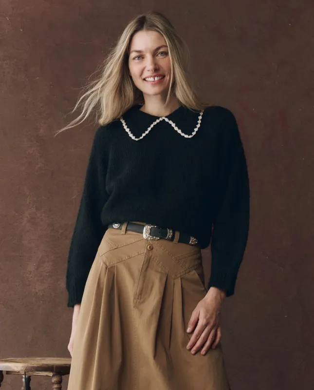 The Crochet Collar Pullover. -- Black with Soft White sold by THE GREAT.