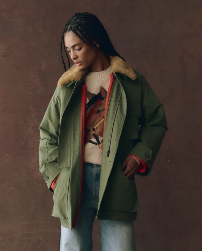 The Quilted Liner Parka. -- Army with Hot Orange sold by THE GREAT.