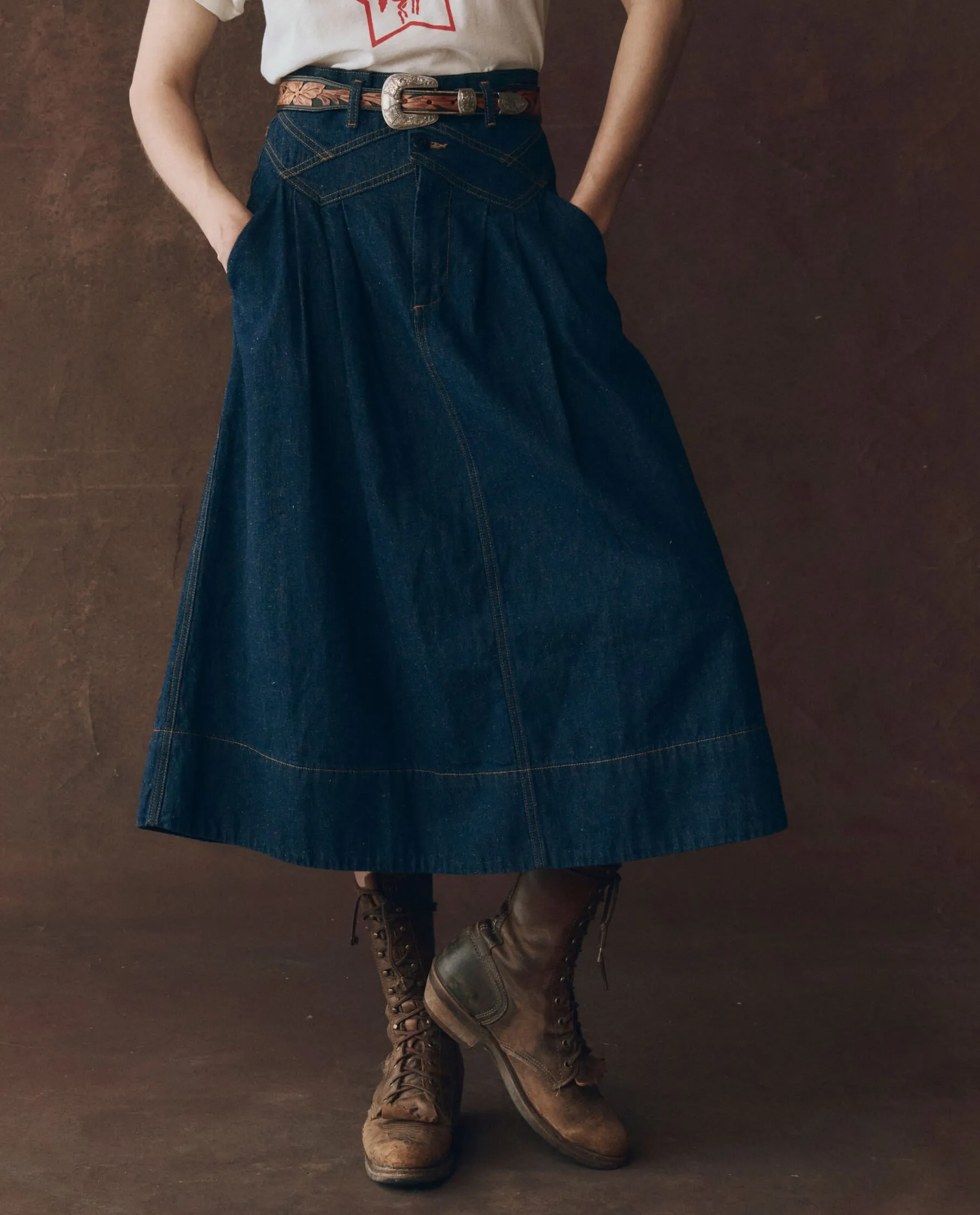 The Field Skirt. -- Midnight Rinse sold by THE GREAT.