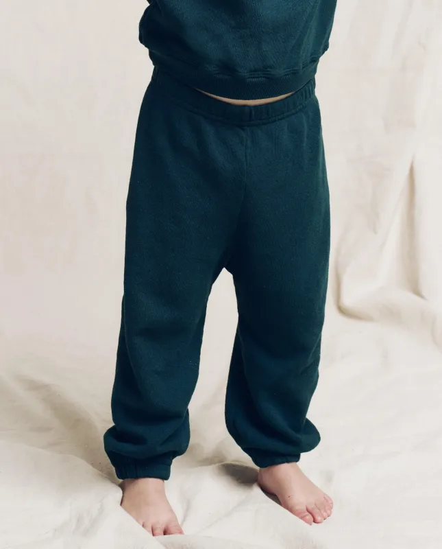 The Little Stadium Sweatpant. Solid -- Dark Slate sold by THE GREAT.