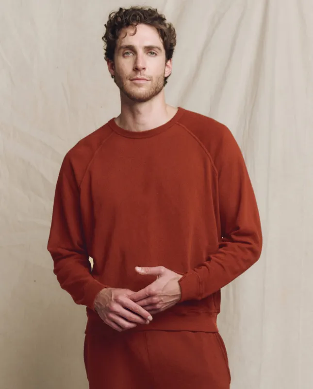 The Men's College Sweatshirt. Solid -- Brick sold by THE GREAT.