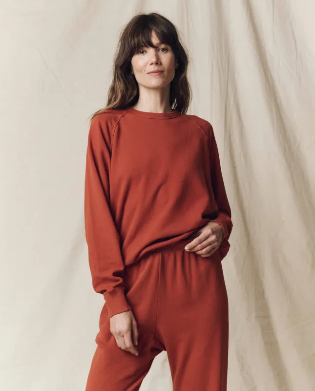 The College Sweatshirt. Solid -- Brick sold by THE GREAT.