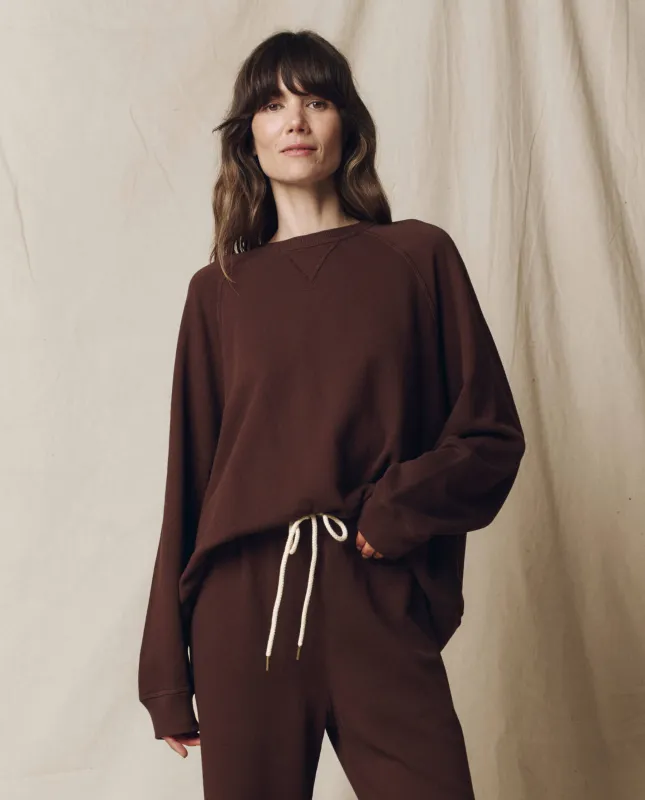 The Slouch Sweatshirt. Solid -- Driftwood sold by THE GREAT.