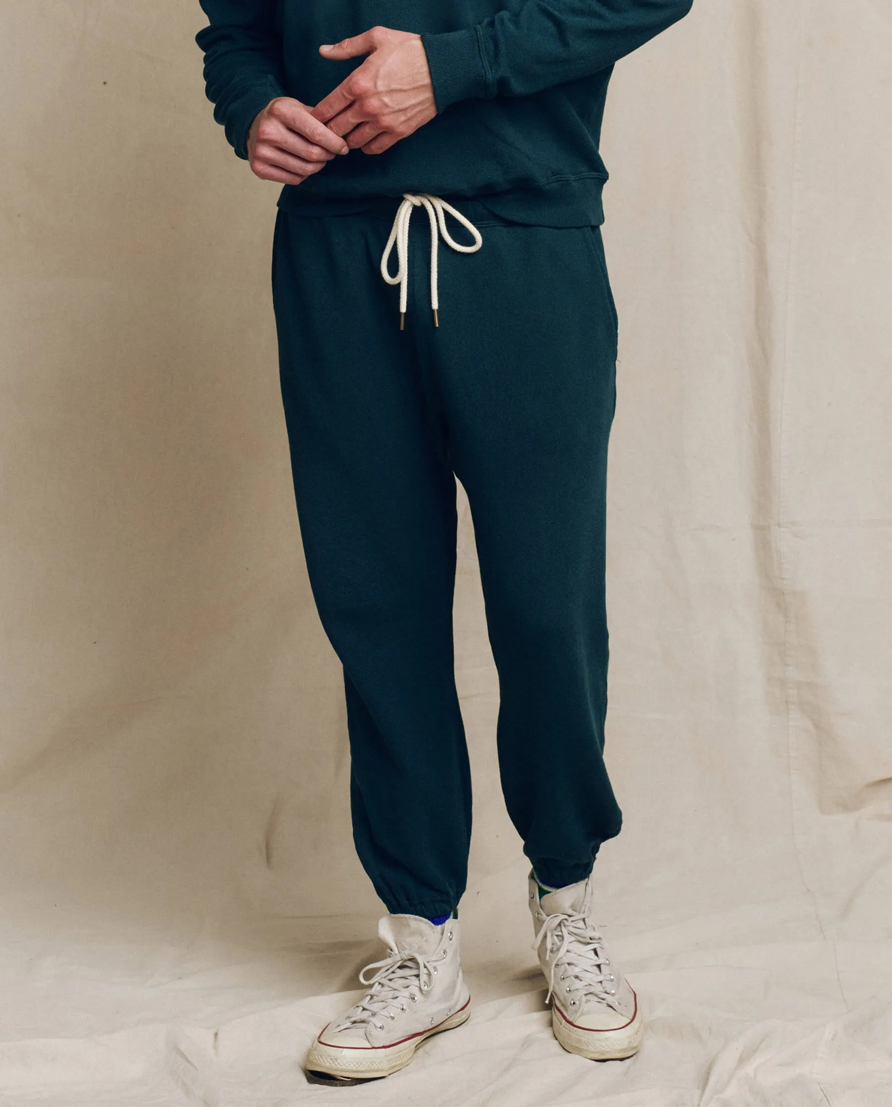 The Men's Stadium Sweatpant. Solid -- Dark Slate sold by THE GREAT.