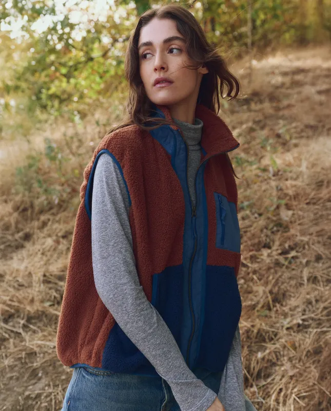 The Plush Tundra Vest. -- Chocolate & Navy sold by THE GREAT.