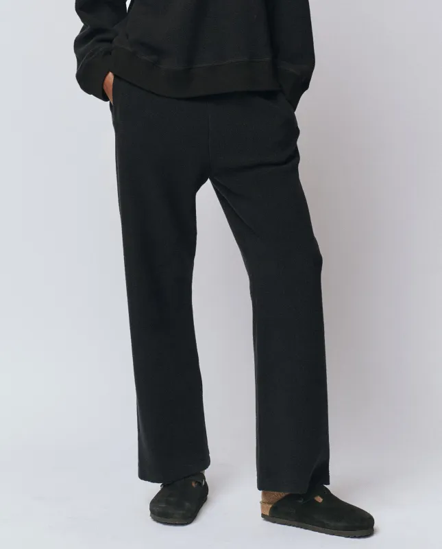 The Plush Victory Sweatpant. -- Almost Black sold by THE GREAT.