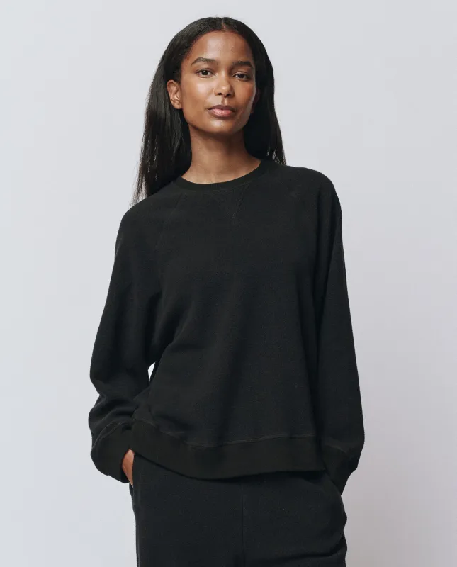 The Plush Slouch Sweatshirt. -- Almost Black sold by THE GREAT.