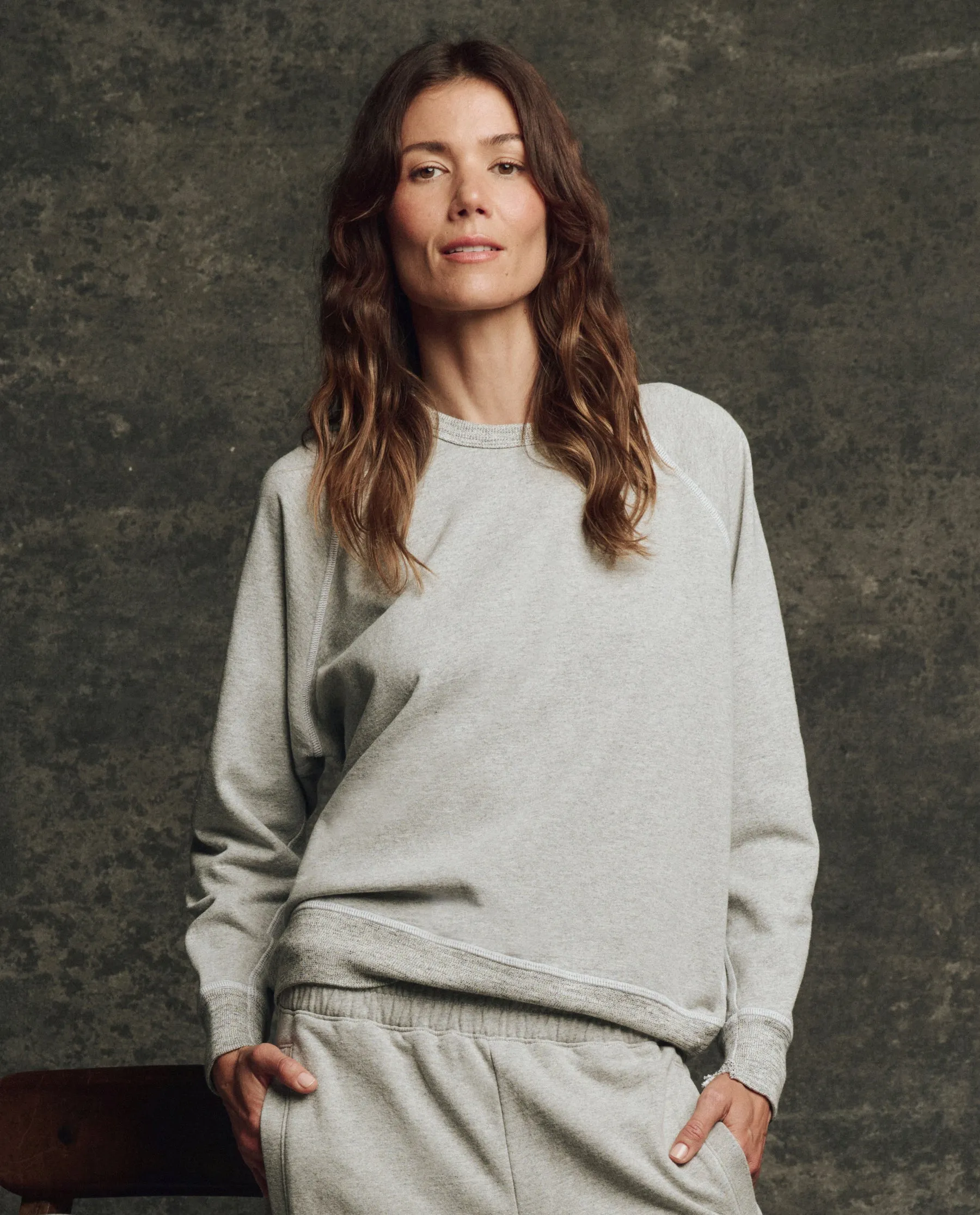 The Fleece College Sweatshirt. Solid -- Heather Grey sold by THE GREAT.