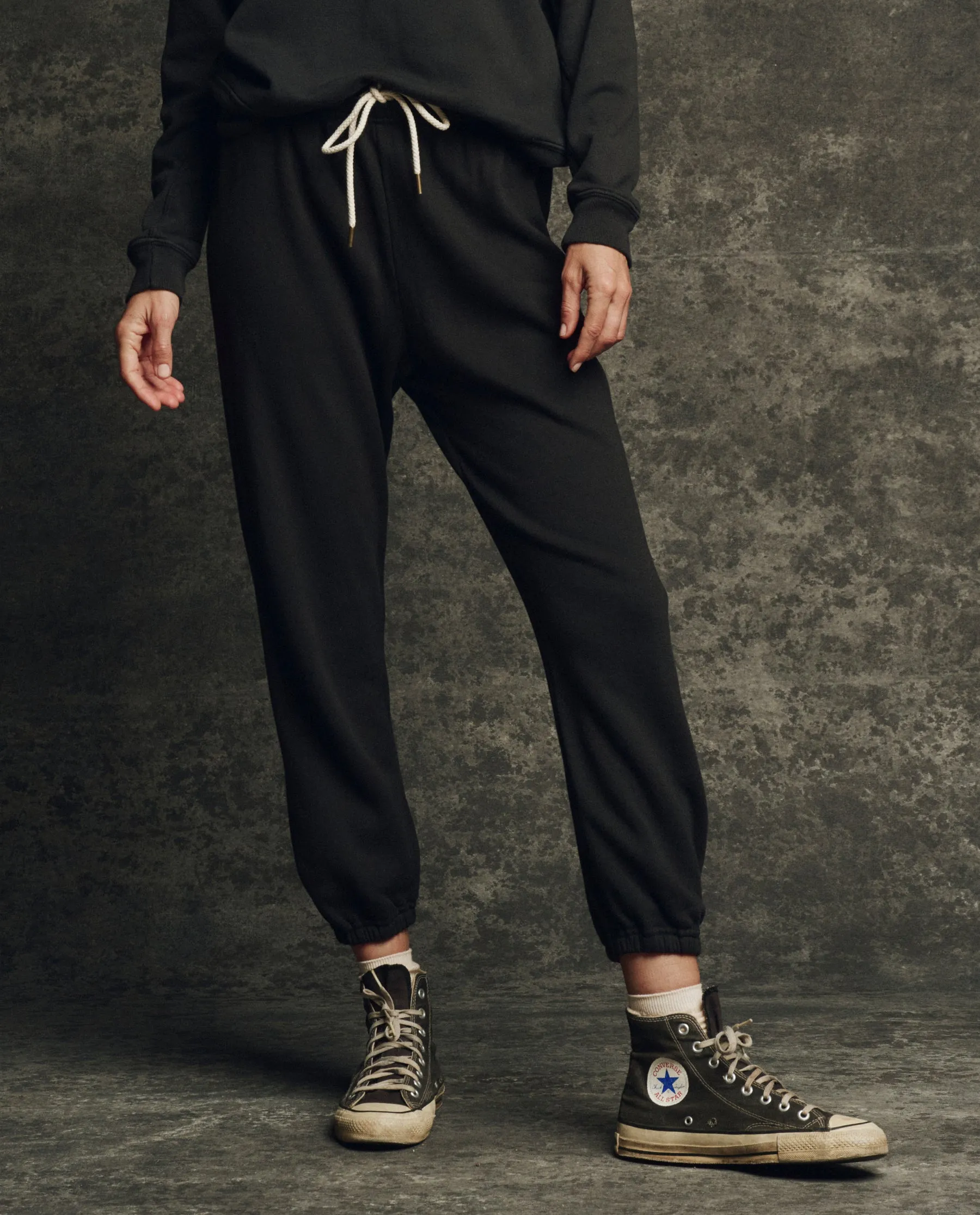 The Fleece Stadium Sweatpant. Solid -- Almost Black sold by THE GREAT.