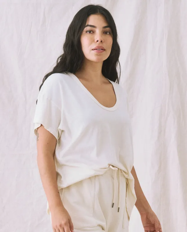 The U-Neck Tee. Solid -- Washed White sold by THE GREAT.