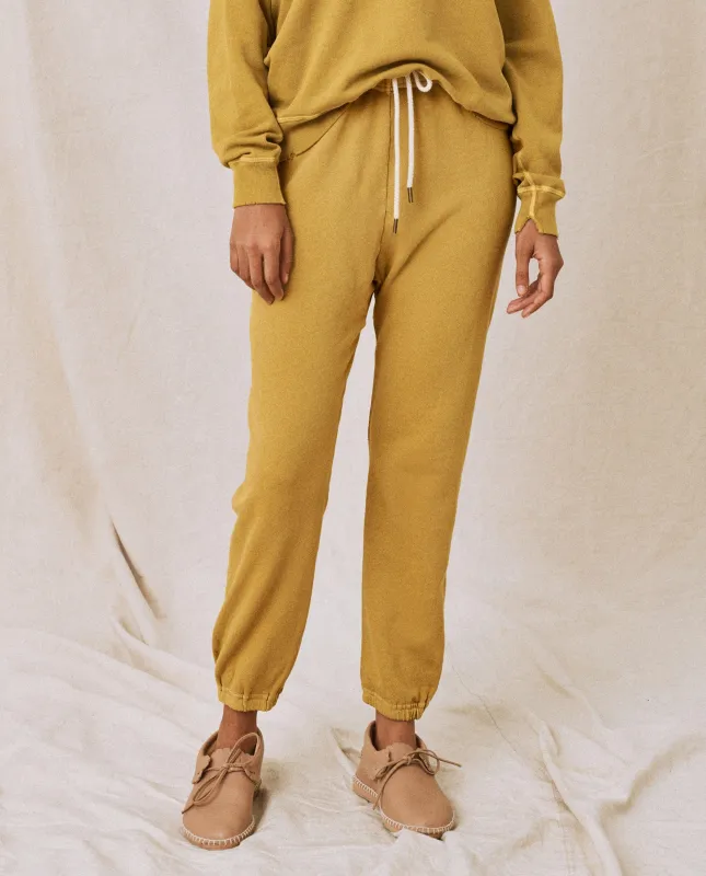 The Stadium Sweatpant. Solid -- Citron sold by THE GREAT.