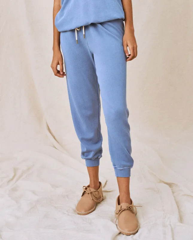 The Cropped Sweatpant. Solid -- Dutch Blue sold by THE GREAT.