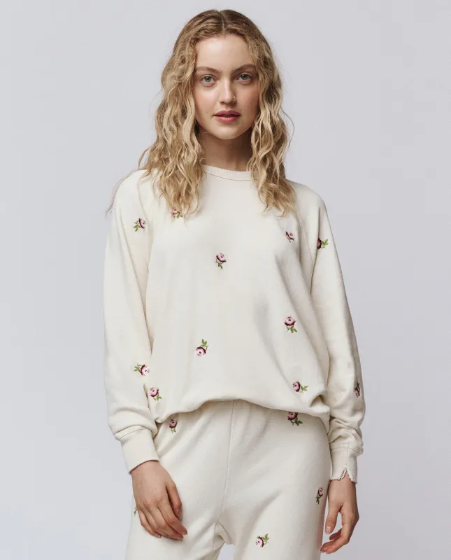 The College Sweatshirt. Embroidered -- Washed White With Embroidered Roses sold by THE GREAT.