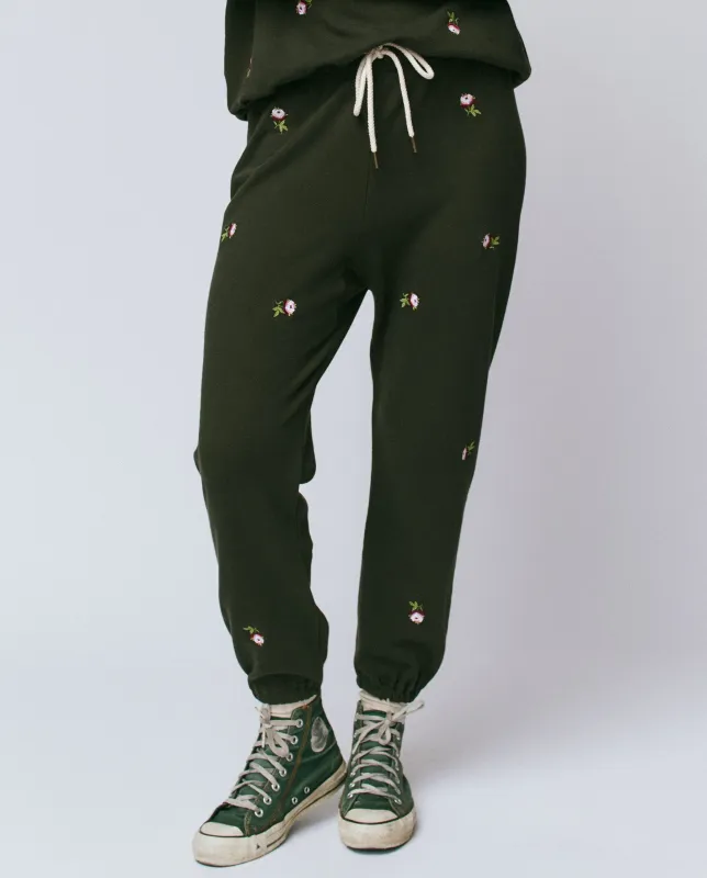 The Stadium Sweatpant. Embroidered -- Woodland Green With Embroidered Roses sold by THE GREAT.