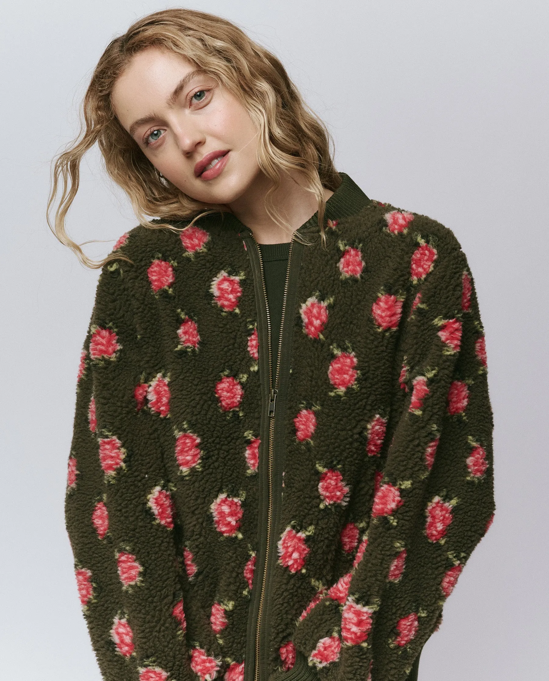 The Zip Front Plush Bomber. -- Woodland Green sold by THE GREAT.