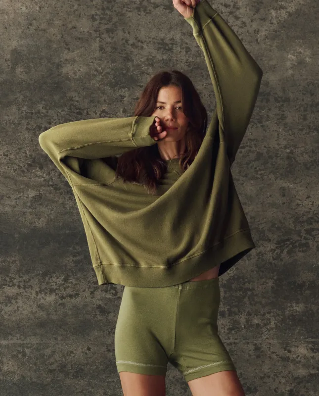 The Fleece Slouch Sweatshirt. Solid -- Army sold by THE GREAT.