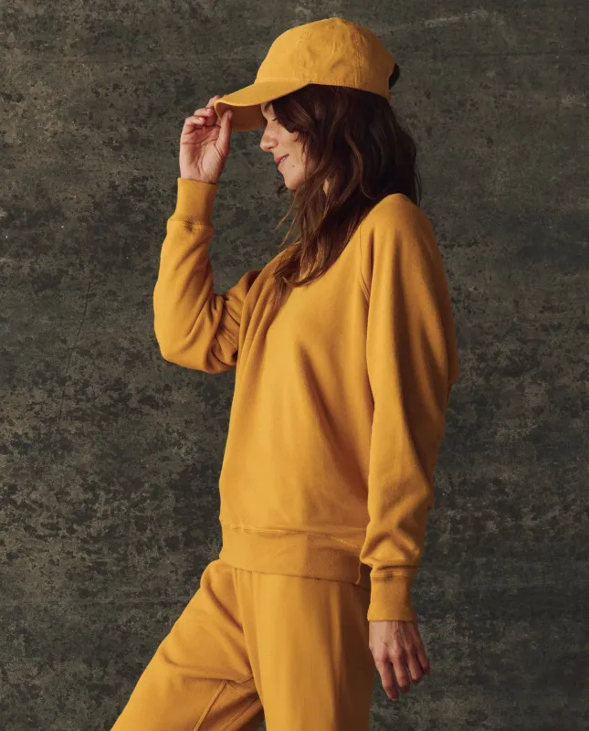 The Fleece Rookie Sweatshirt. Solid -- Bright Yellow made by THE GREAT.