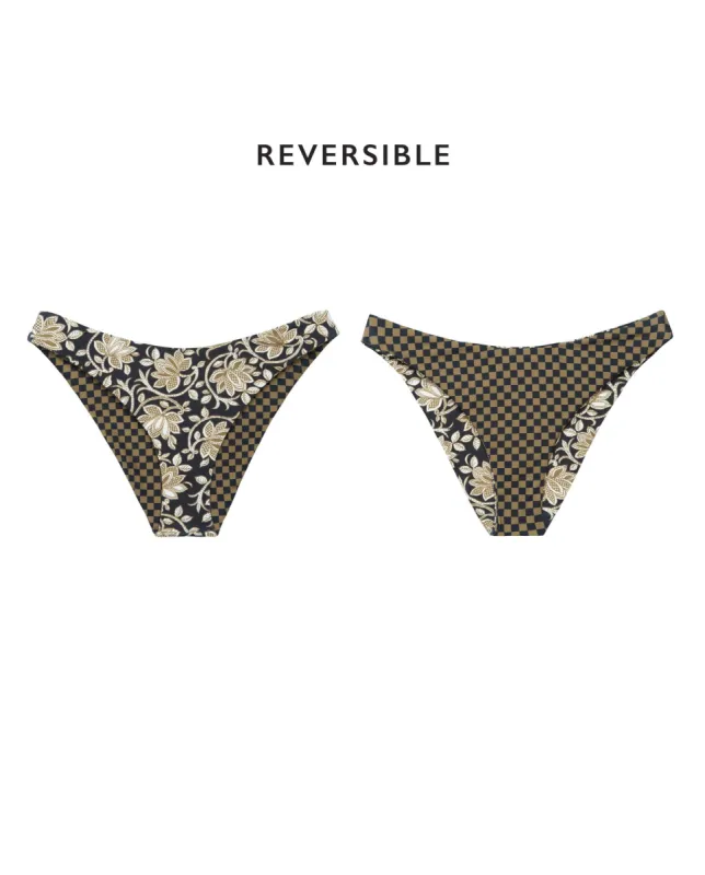 The Reversible Cheeky Brief. -- Black Oasis Floral and Bronze Check sold by THE GREAT.