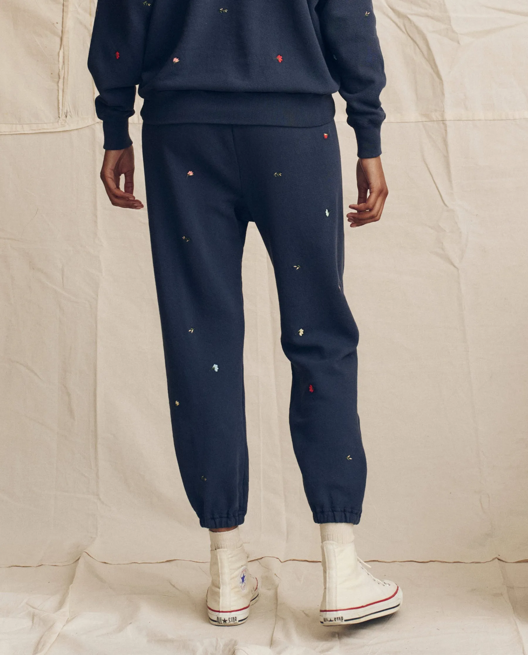 The Stadium Sweatpant. Embroidered -- Navy with Tossed Floral Embroidery sold by THE GREAT. product image thumbnail 2