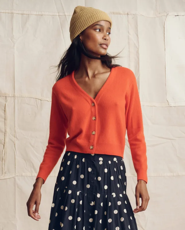 The Cashmere Tiny V Neck Cardigan. -- Hot Orange sold by THE GREAT.