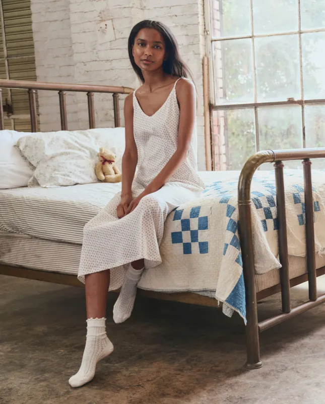 The Slip Sleeper V Neck Dress. -- Calico Rose sold by THE GREAT.