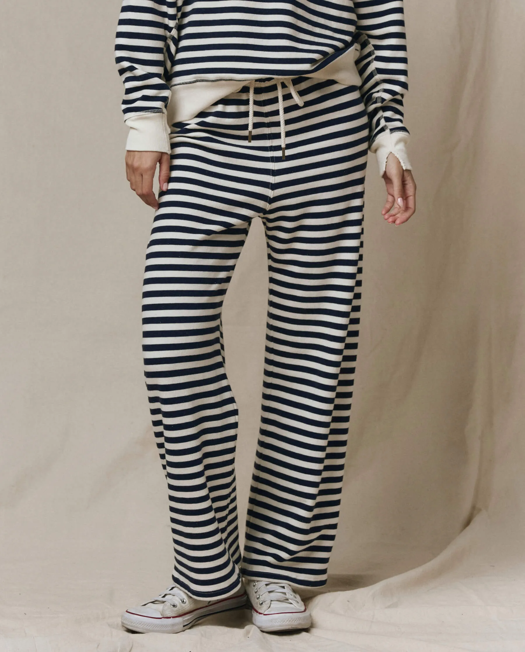 The Lap Sweatpant. -- Navy Sailor Stripe sold by THE GREAT.