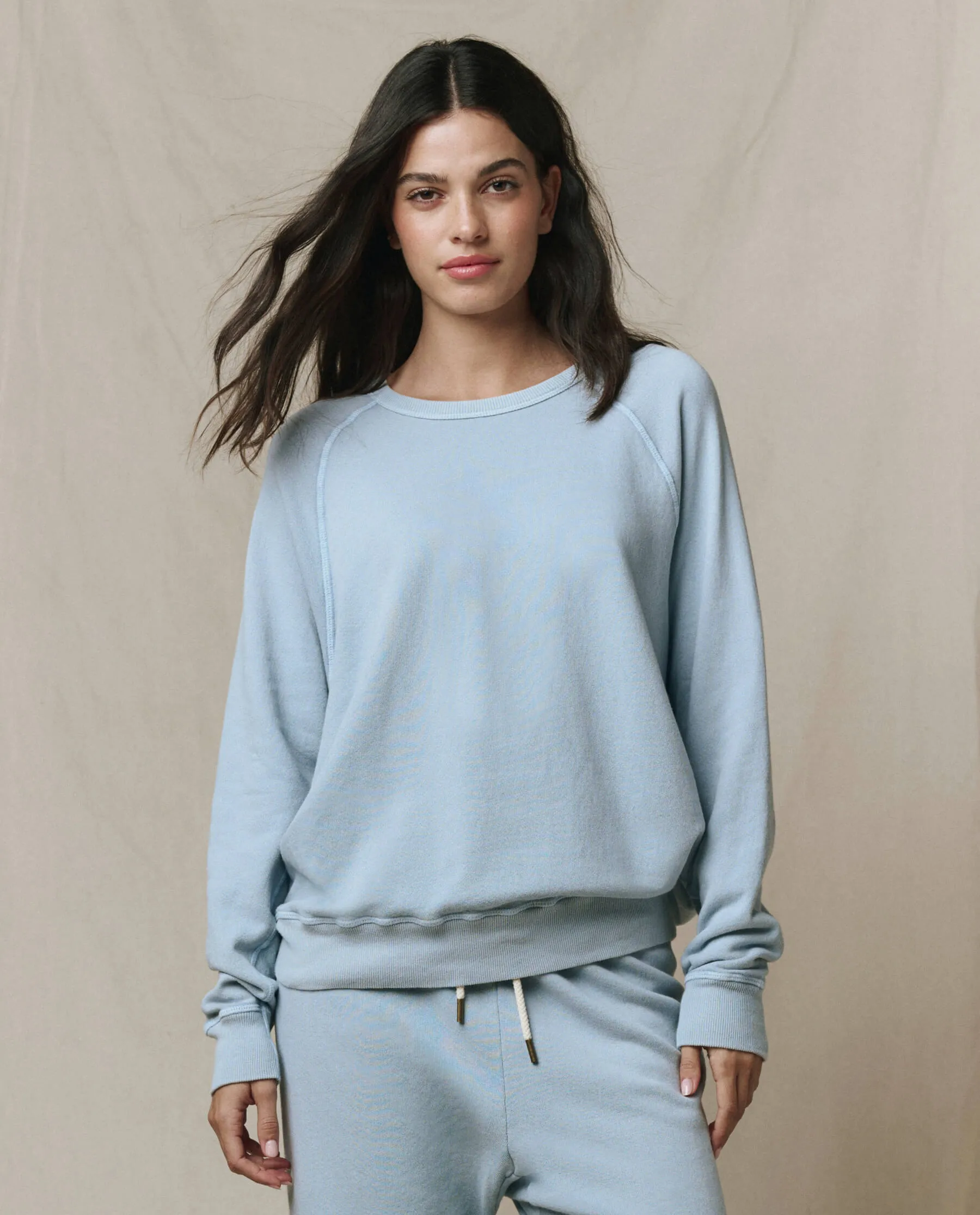 The College Sweatshirt. Solid -- Whisper Blue sold by THE GREAT.