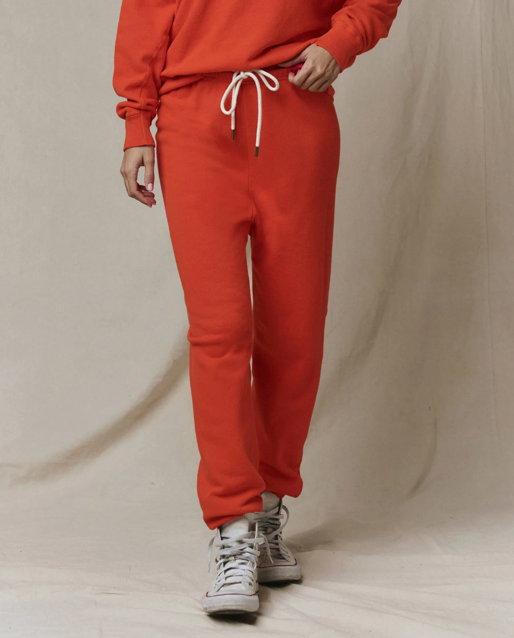 The Stadium Sweatpant. Solid -- Persimmon sold by THE GREAT.