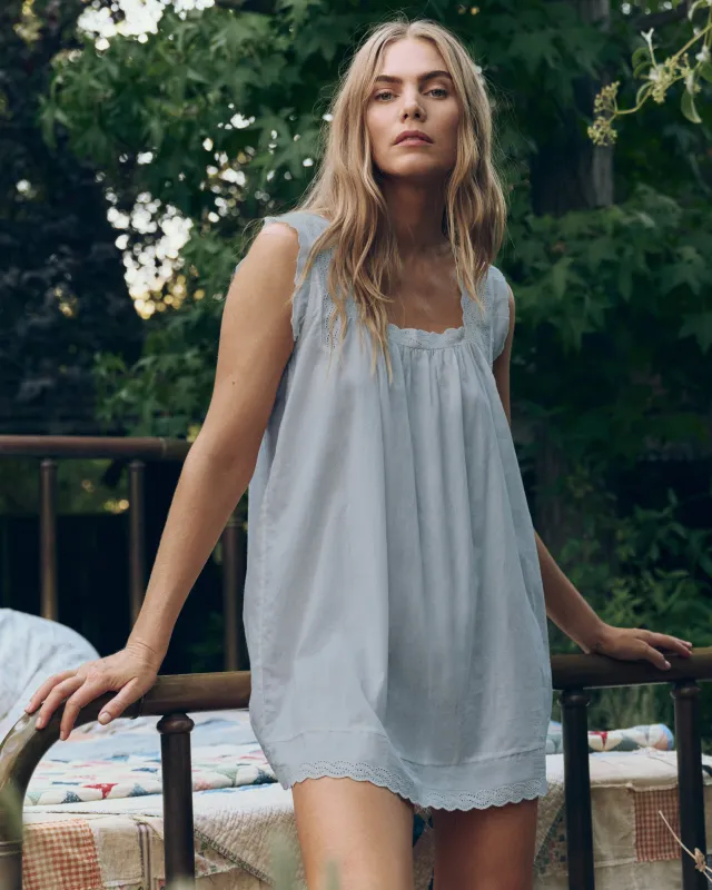 The Eyelet Mini Tank Dress. -- Rainwater sold by THE GREAT.