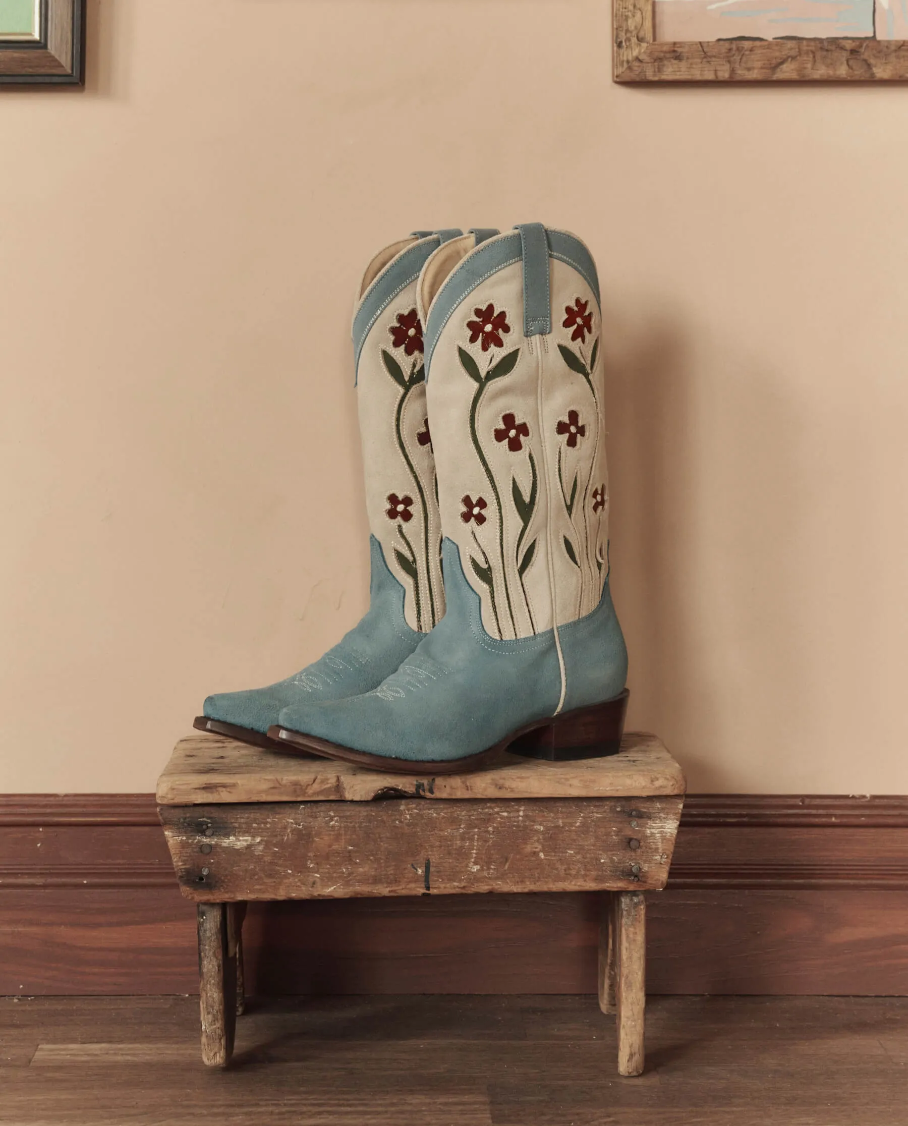 The Cowboy Boot (Suede Floral). -- Washed Indigo Floral sold by THE GREAT.