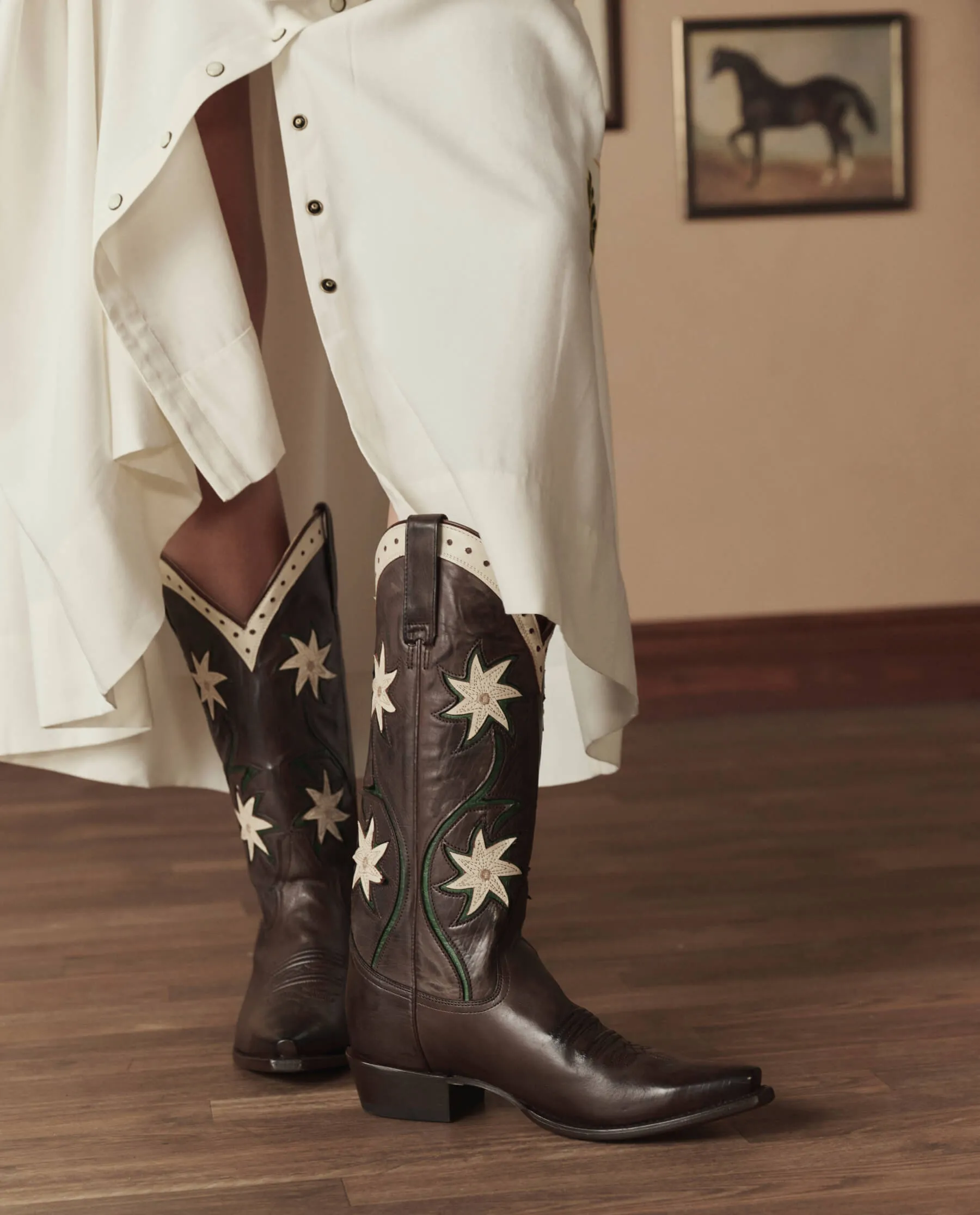 The Cowboy Boot (Leather Floral). -- Brown Floral sold by THE GREAT.
