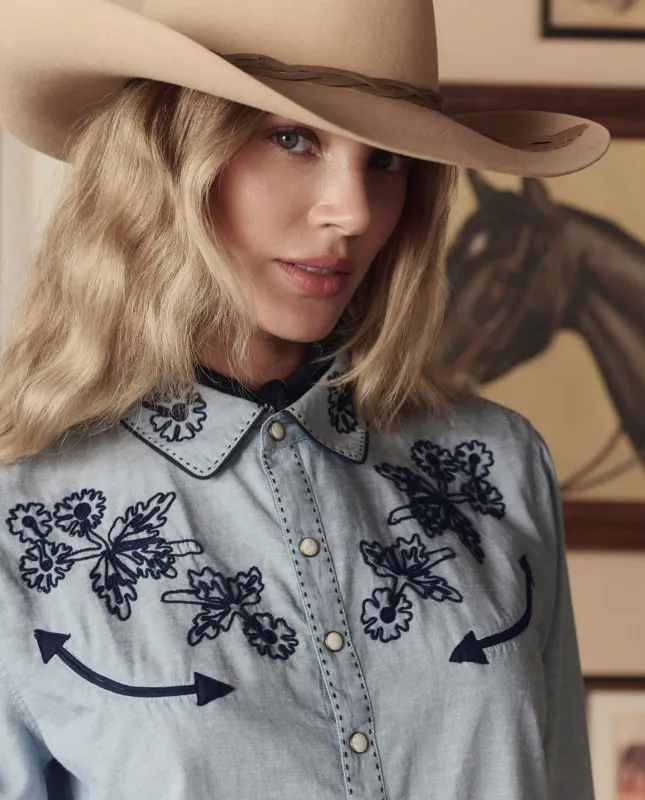 The Chambray Embroidered Western Shirt. -- Chambray sold by THE GREAT.