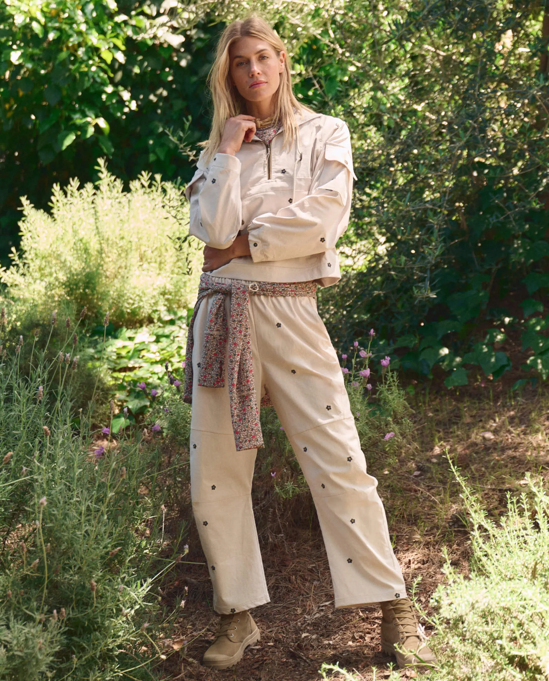 The Embroidered Outpost Pant. -- Cream With Black Daisies sold by THE GREAT.