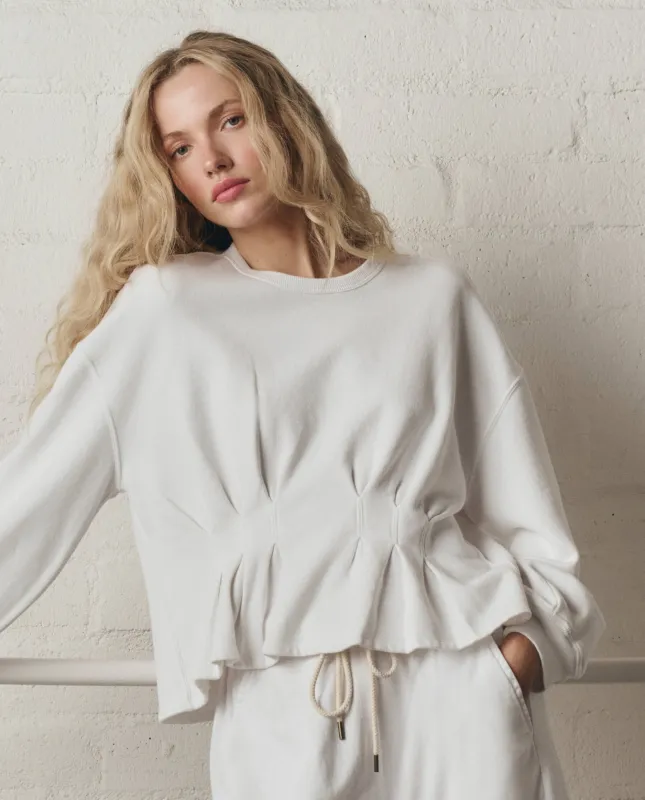 The Slouchy Corset Sweatshirt. -- True White made by THE GREAT.