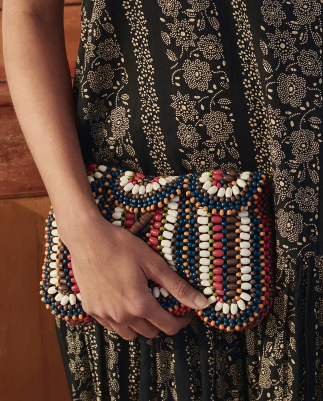 The Beaded Clutch. -- Cabana Stripe made by THE GREAT.