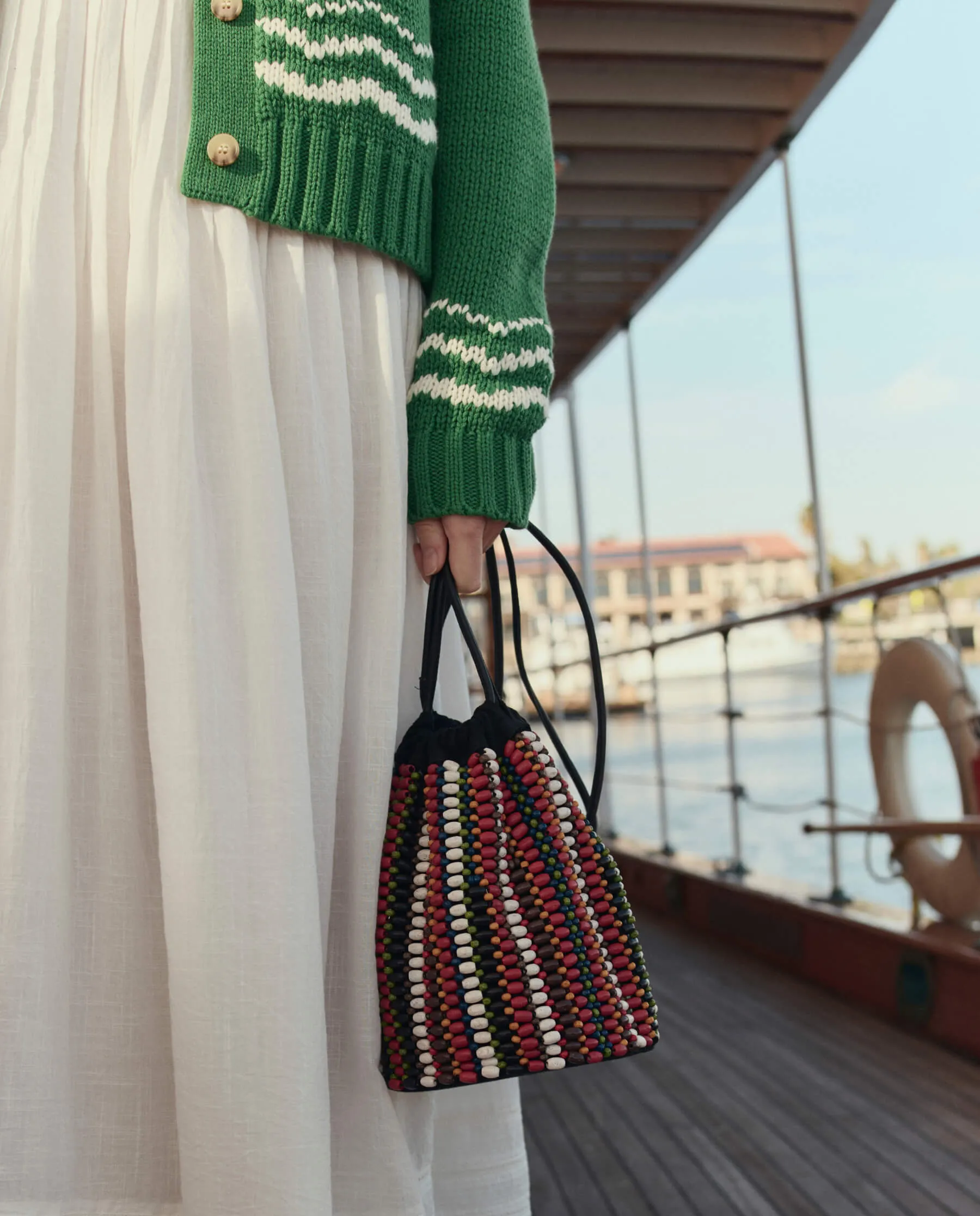 The Beaded Cinched Bucket Bag. -- Cabana Stripe sold by THE GREAT. product image thumbnail 4
