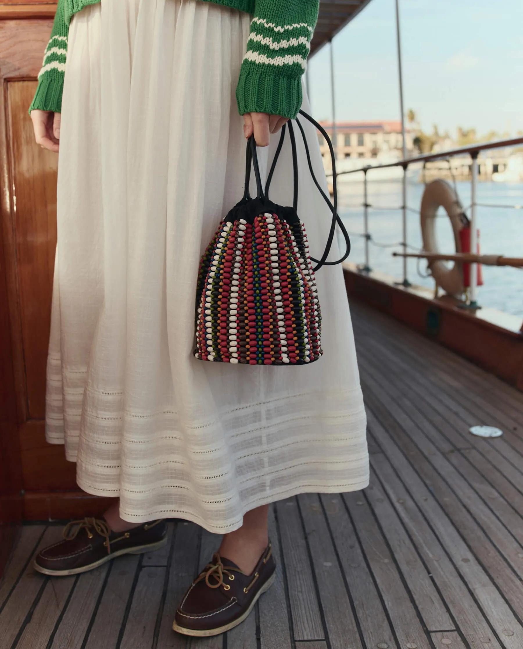 The Beaded Cinched Bucket Bag. -- Cabana Stripe sold by THE GREAT. product image thumbnail 3