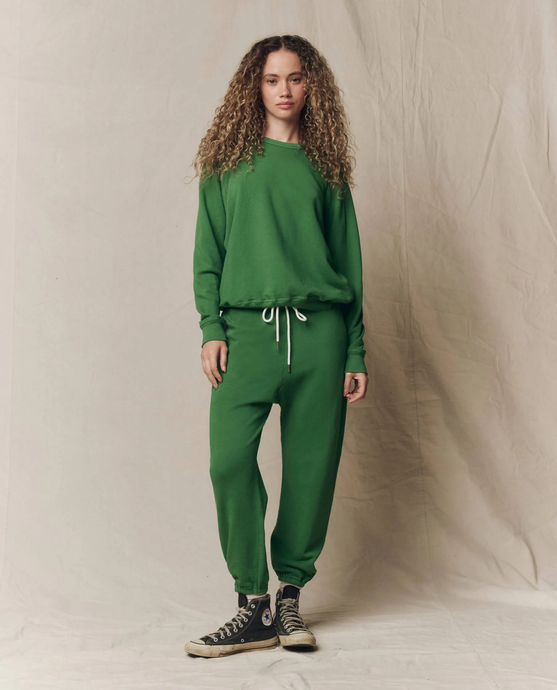 The Stadium Sweatpant. Solid -- Fennel sold by THE GREAT.