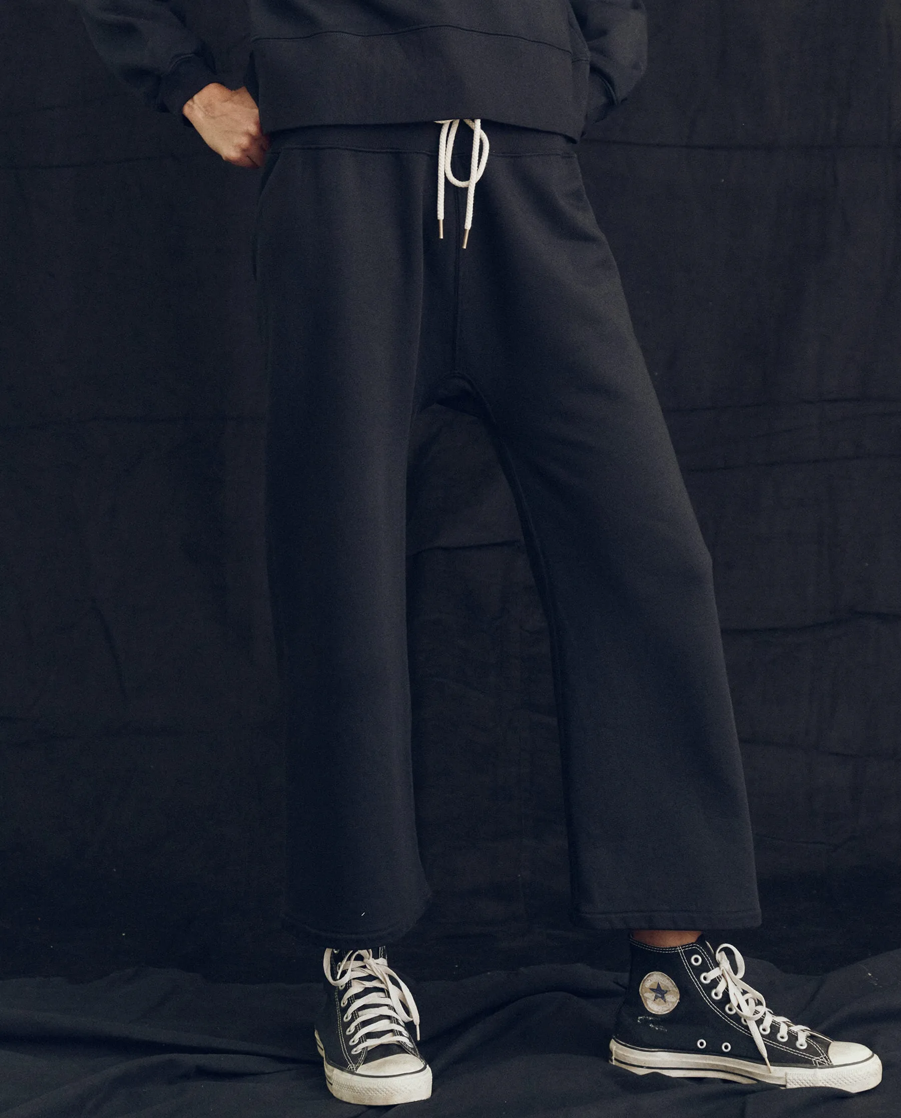 The Relay Sweatpant. Solid -- Almost Black sold by THE GREAT.