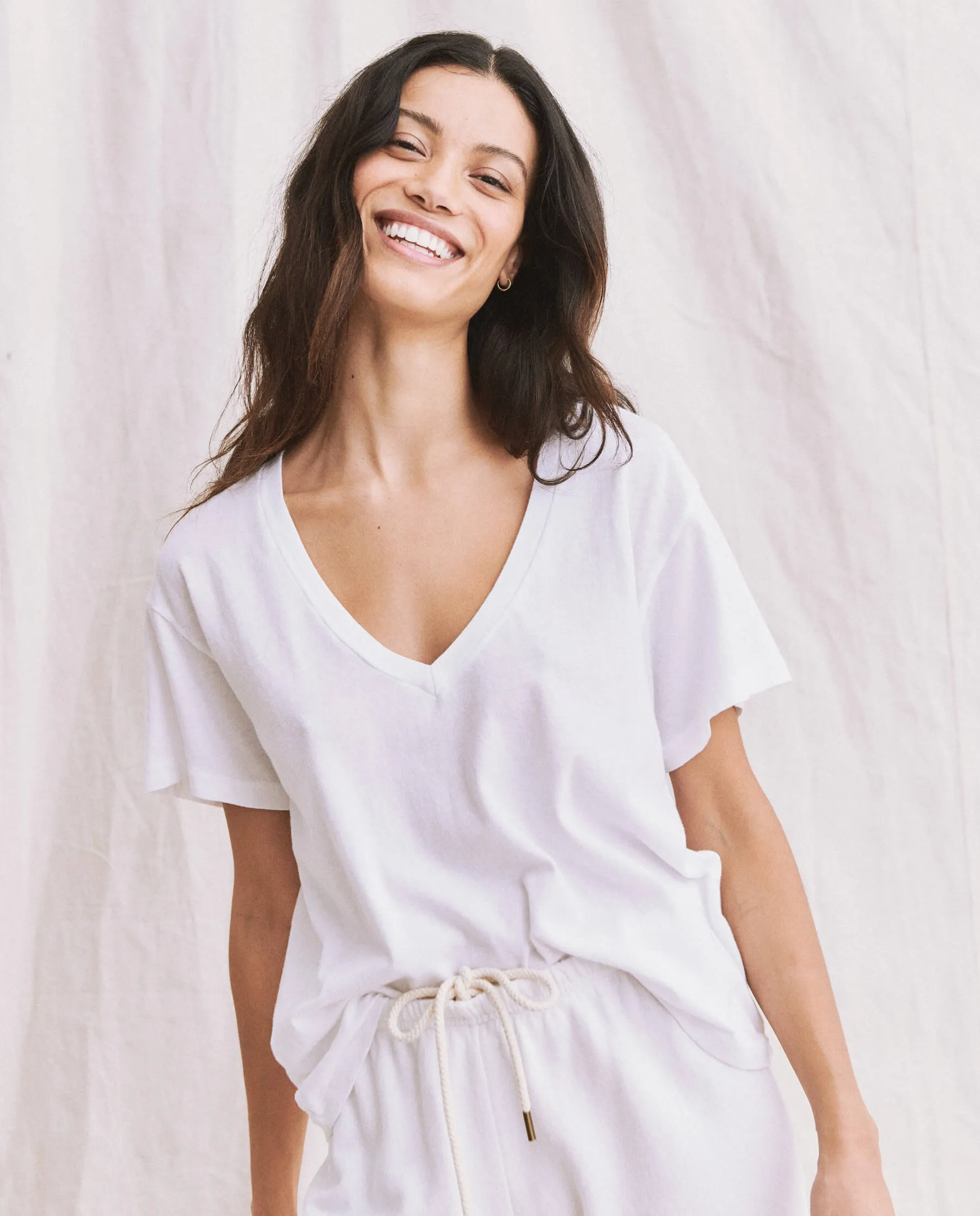 The V-Neck Tee. -- True White sold by THE GREAT.