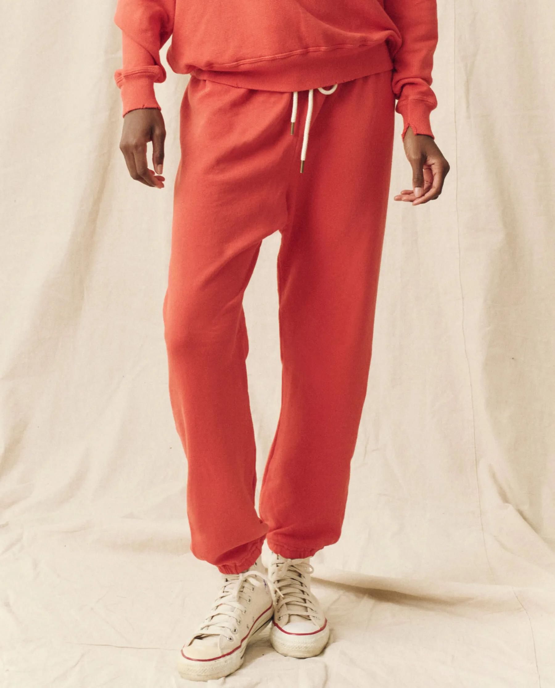 The Stadium Sweatpant. Solid -- Heirloom Tomato sold by THE GREAT.