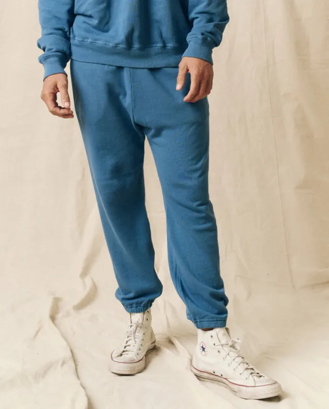 The Men's Stadium Sweatpant. Solid -- Glacier Blue sold by THE GREAT.