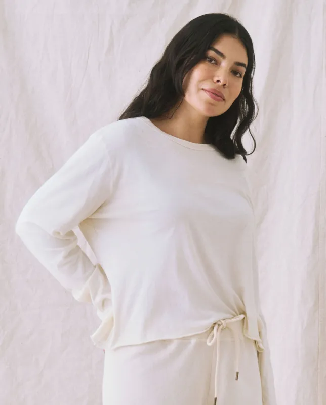 The Long Sleeve Crop Tee. -- Washed White sold by THE GREAT.