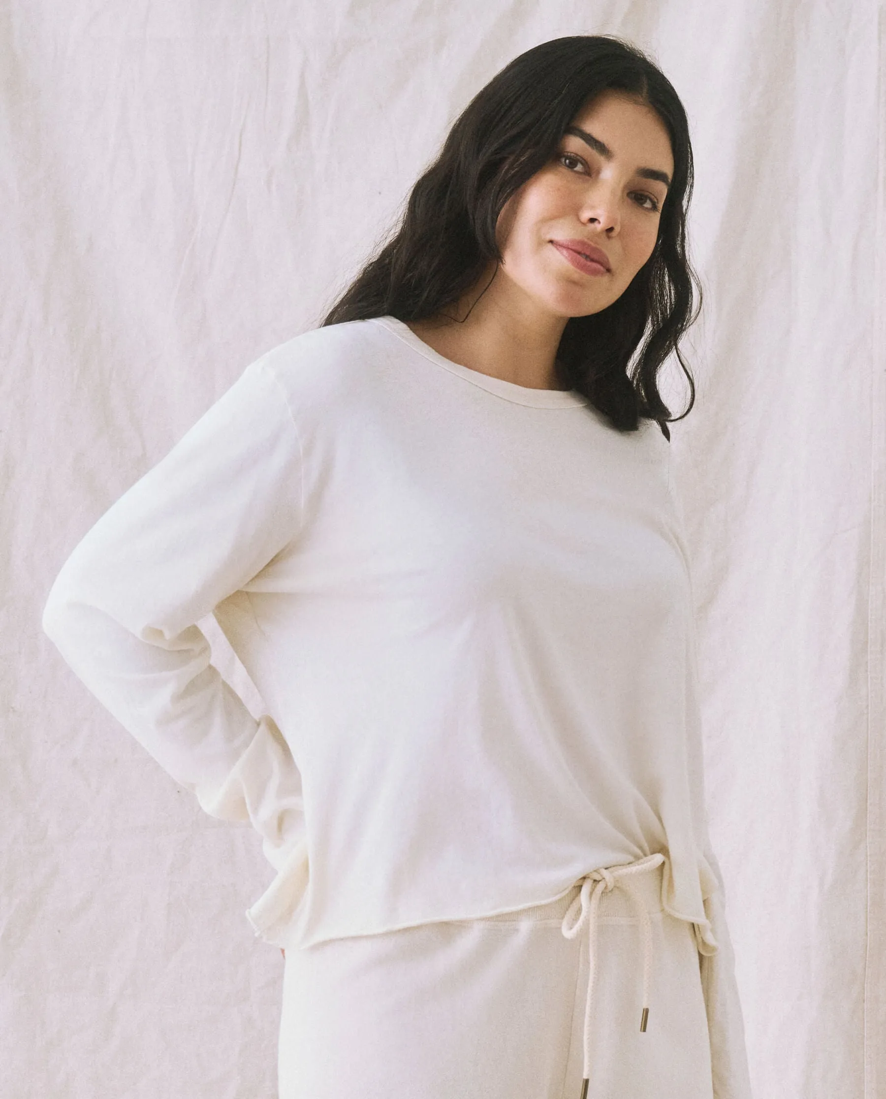 The Long Sleeve Crop Tee. -- Washed White sold by THE GREAT.