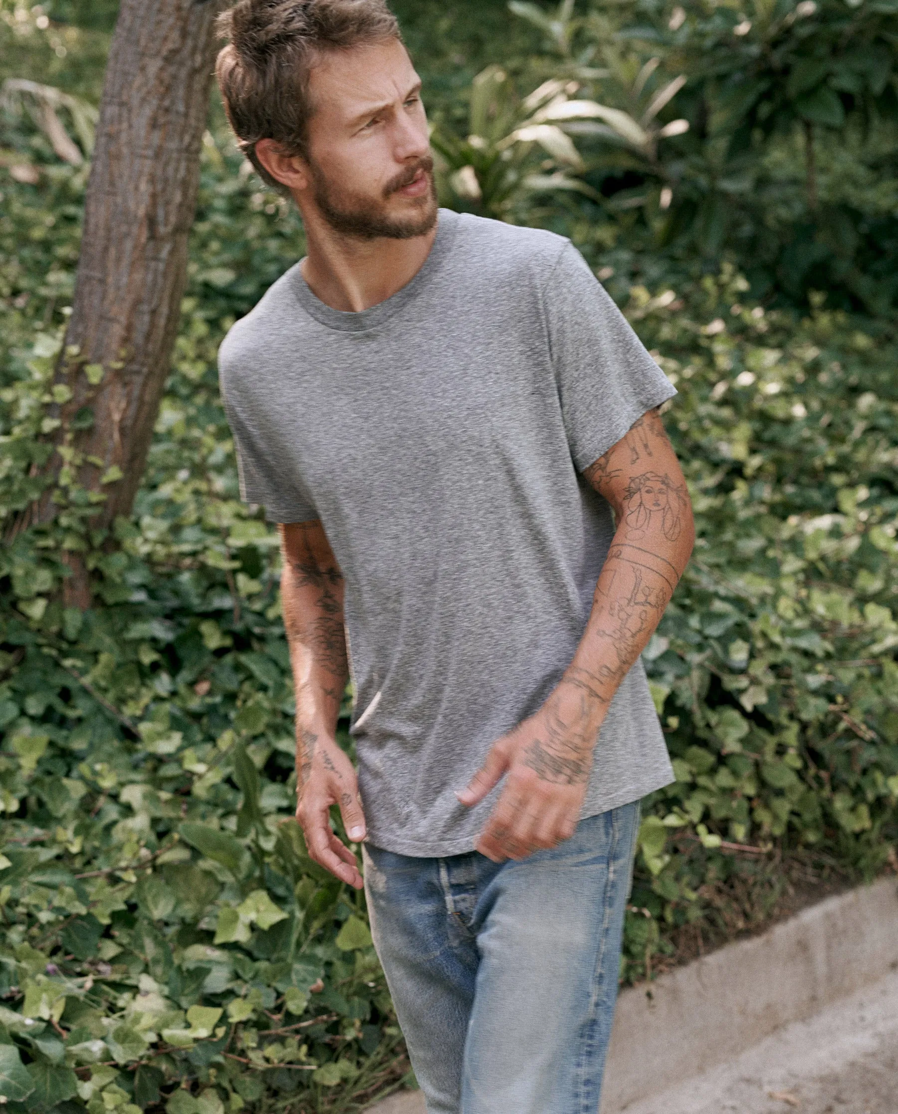The Men's Slim Tee. -- HEATHER GREY sold by THE GREAT.