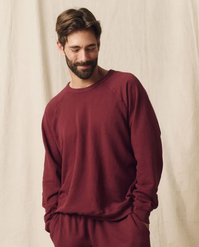 The Men's College Sweatshirt. Solid -- Mulled Wine sold by THE GREAT.