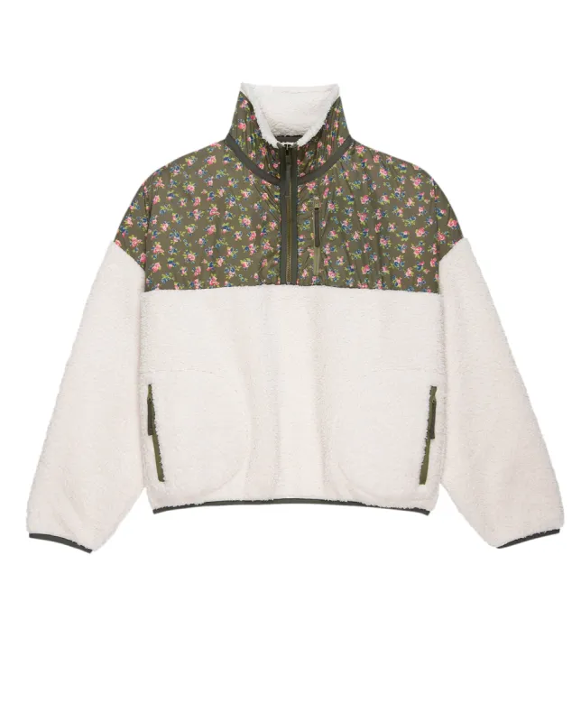 The Plush Colorblock Terrain Half Zip. -- Cypress Basin Floral and Snowdrift sold by THE GREAT.