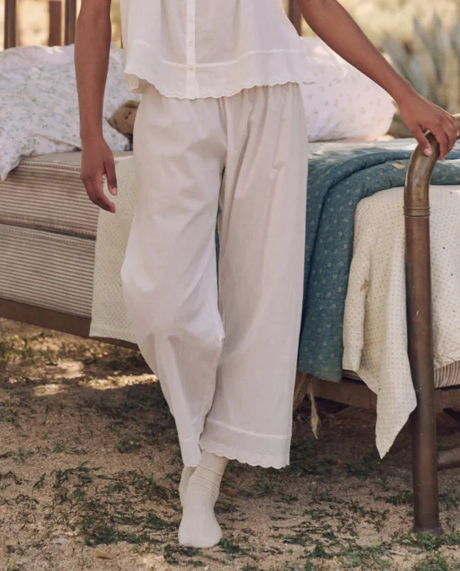 The Eyelet Easy Sleep Pant. -- True White sold by THE GREAT.