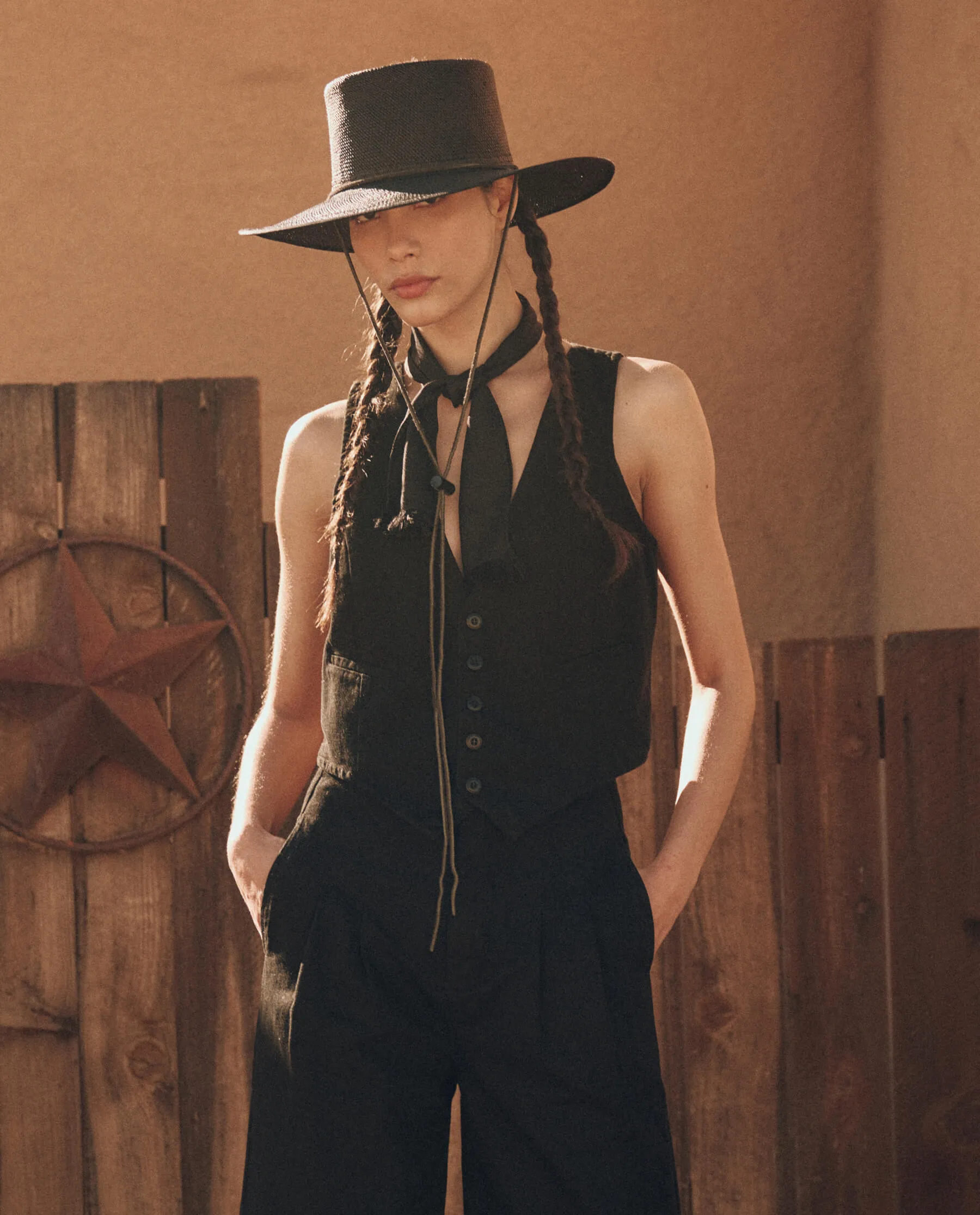 The Suit Vest. -- Black sold by THE GREAT.