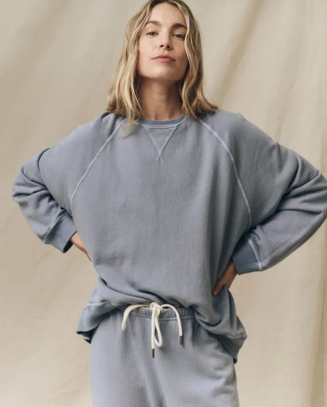 The Slouch Sweatshirt. Solid -- Big Sky sold by THE GREAT.